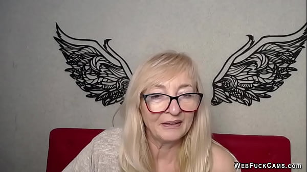 Amateur blonde mature lady with glasses on webcam